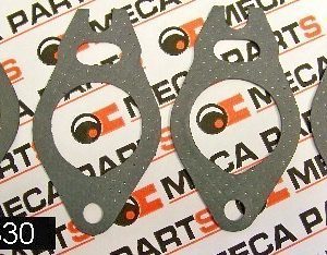 Fibrous gaskets between head & manifold